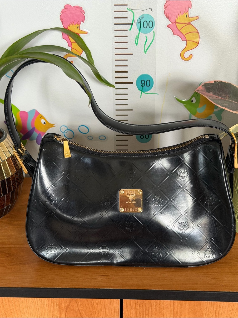 MCM Black Leather Shoulder Bag with Gold Logo Plaque